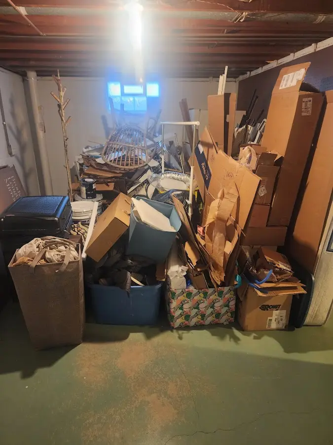 Roll-off dumpster container at job site for 15 Yard Dumpster Rental in Navasota